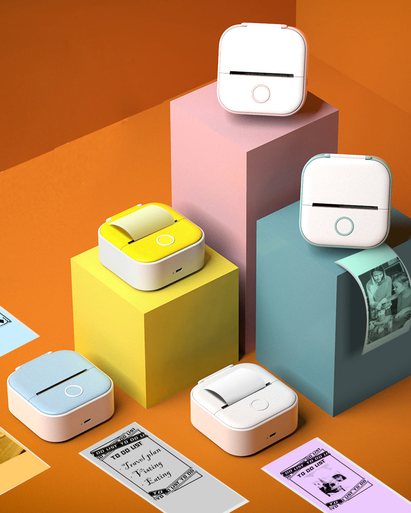 Colorful portable photo printers on a geometric background