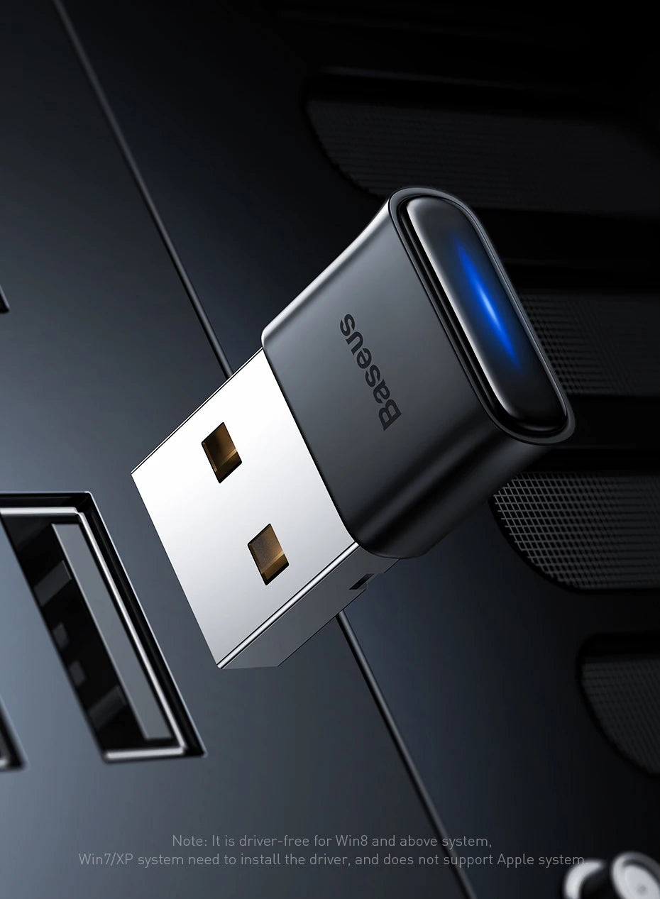 Baseus Bluetooth adapter plugged into a USB port