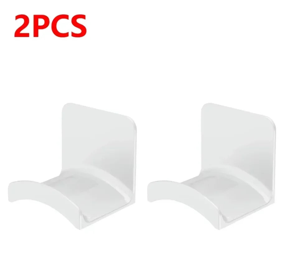 Two white HookDock adhesive headphone hooks