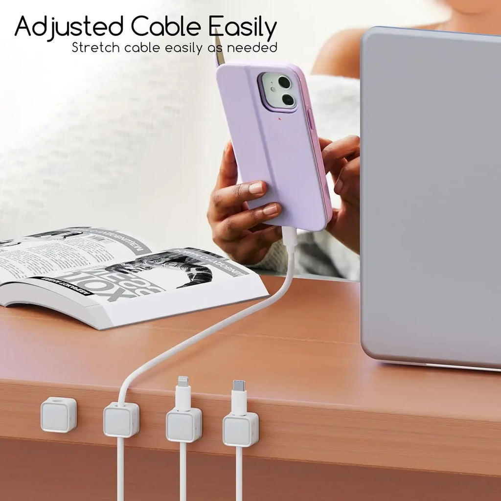 MagneClip cable clips holding desk charging cables