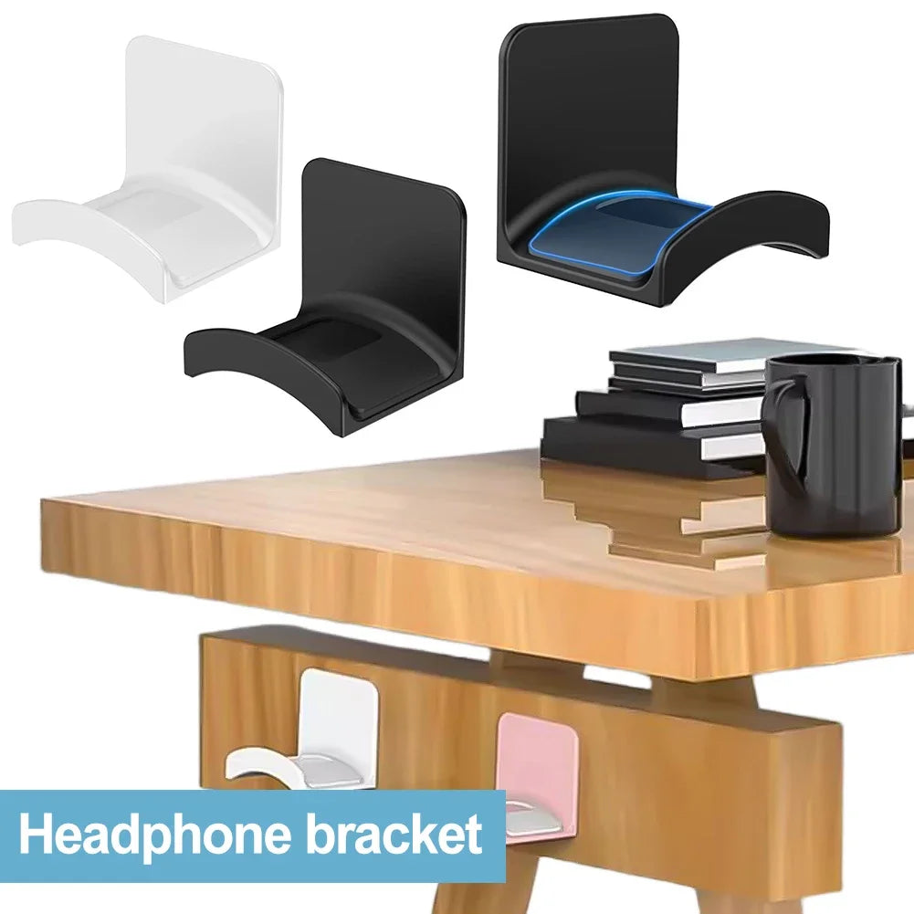 HookDock adhesive headphone hooks in black and white mounted under a desk