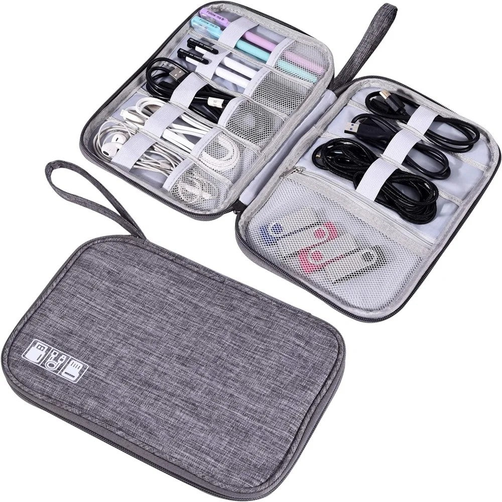 CableKit travel cable organizer opened with cables and small accessories inside