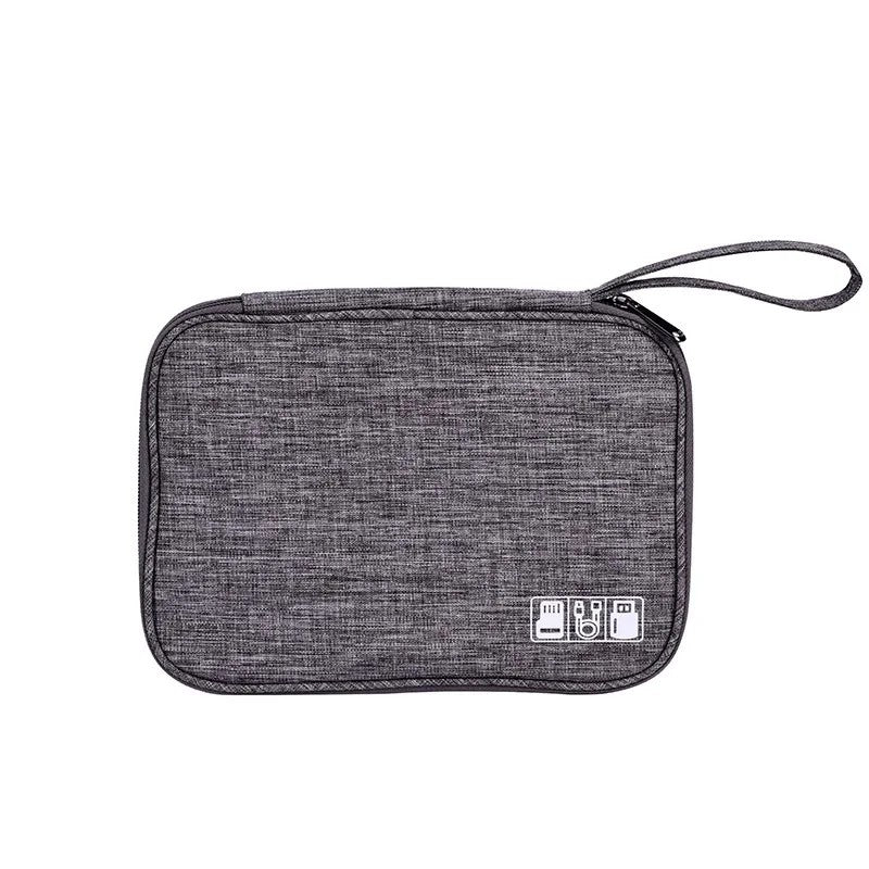 CableKit grey travel cable organizer closed on a clean white background