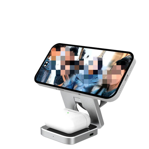 Foldable wireless charging station holding a phone horizontally for desk or bedside viewing