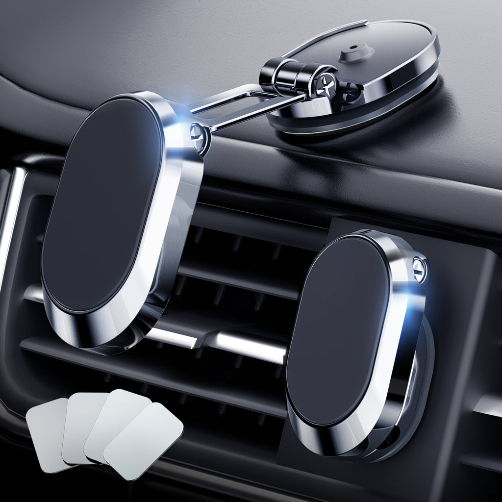 Silver magnetic dashboard phone holder mounted in a car interior