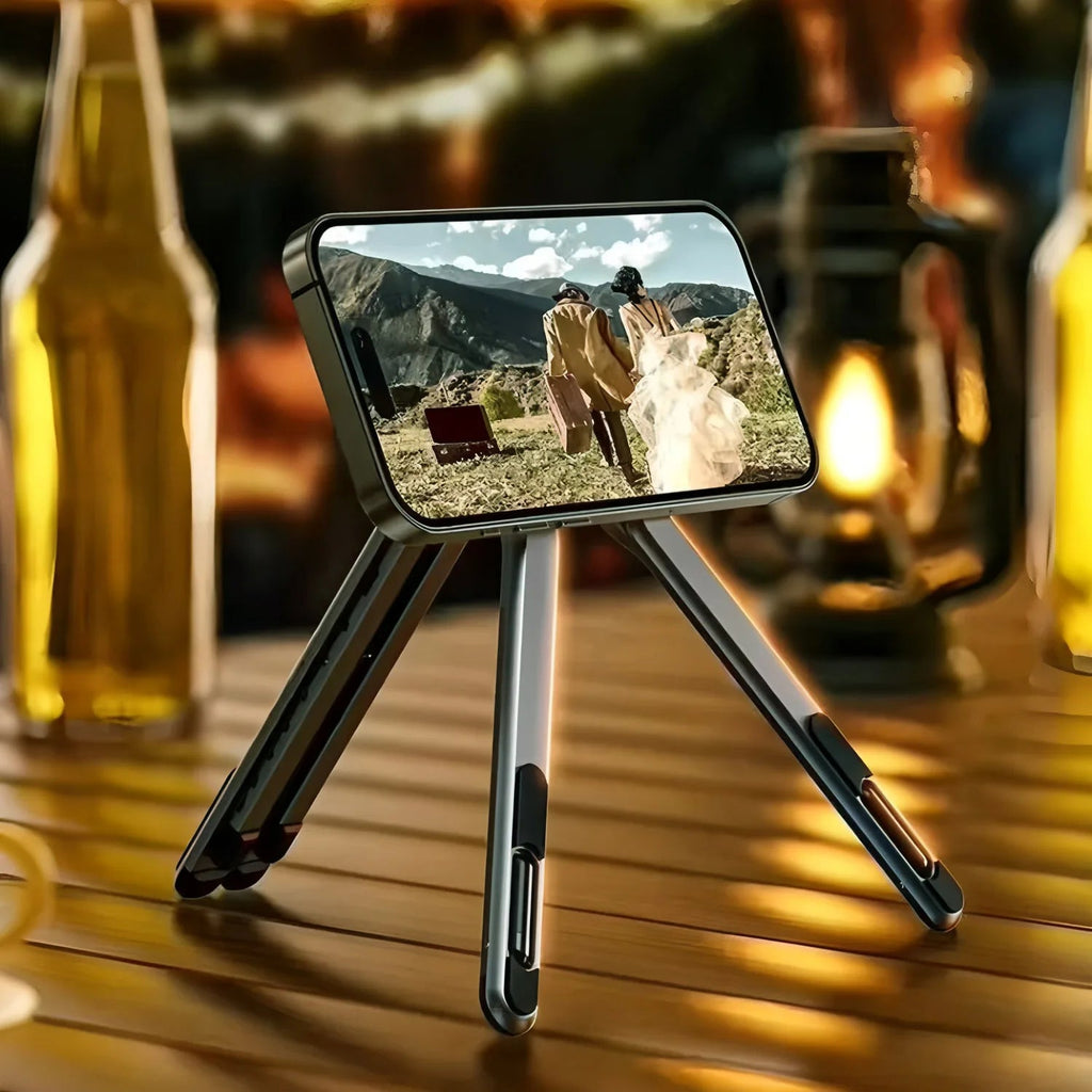 SnapStand gray magnetic phone tripod in tabletop use