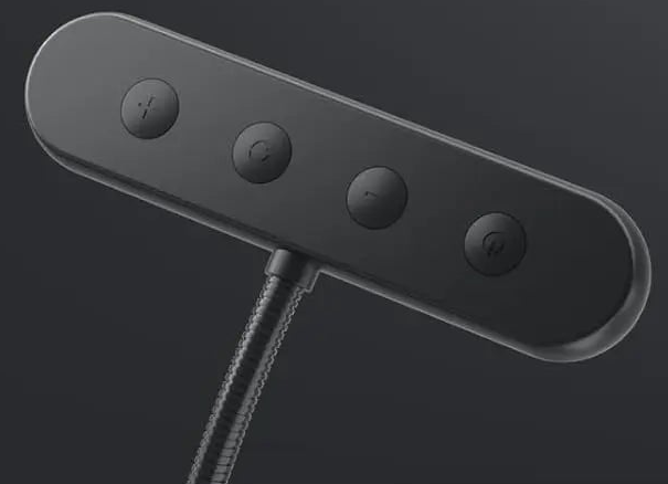 Rear of the black linear light head showing four control buttons.