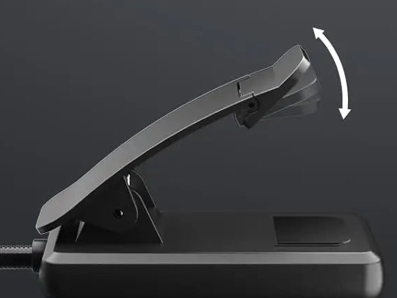 Side view of the book-light clamp opened above its base.