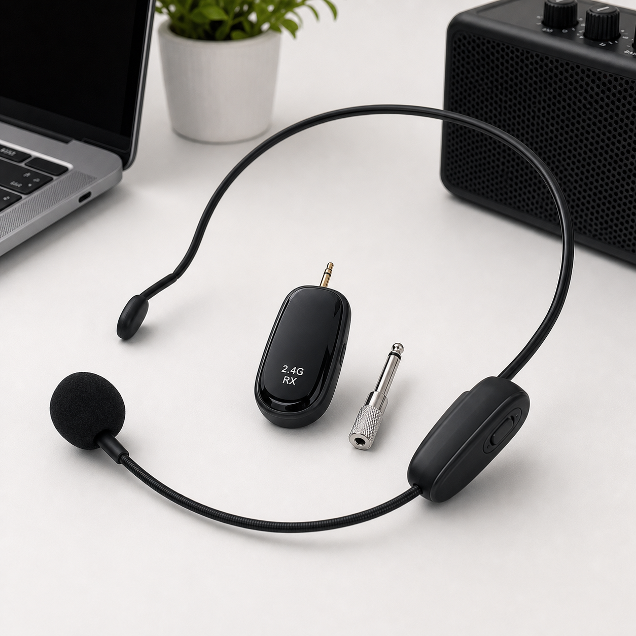 Wireless headset microphone kit arranged on a clean desk setup